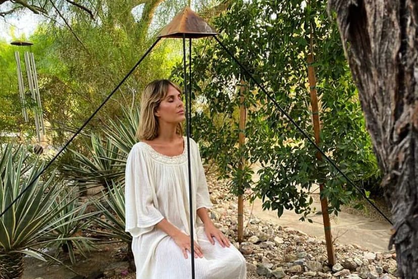 woman meditating at Palm Springs spa resort We Care Spa